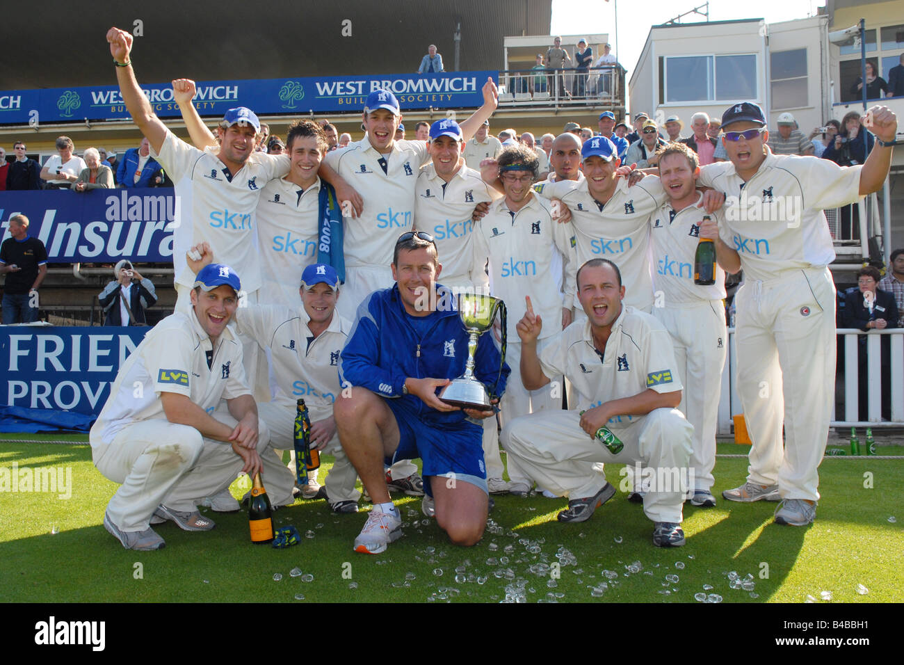 Warwickshire County Cricket Club boss Ashley Giles celebrates with his team after winning the second division championship Stock Photo