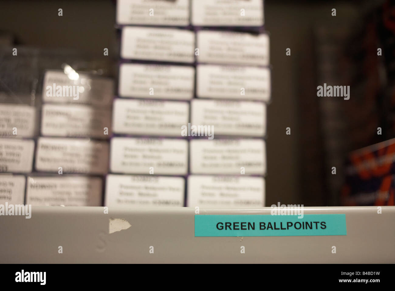 Ballpoint pens stacked on a shelf in the stationery room of an auditing