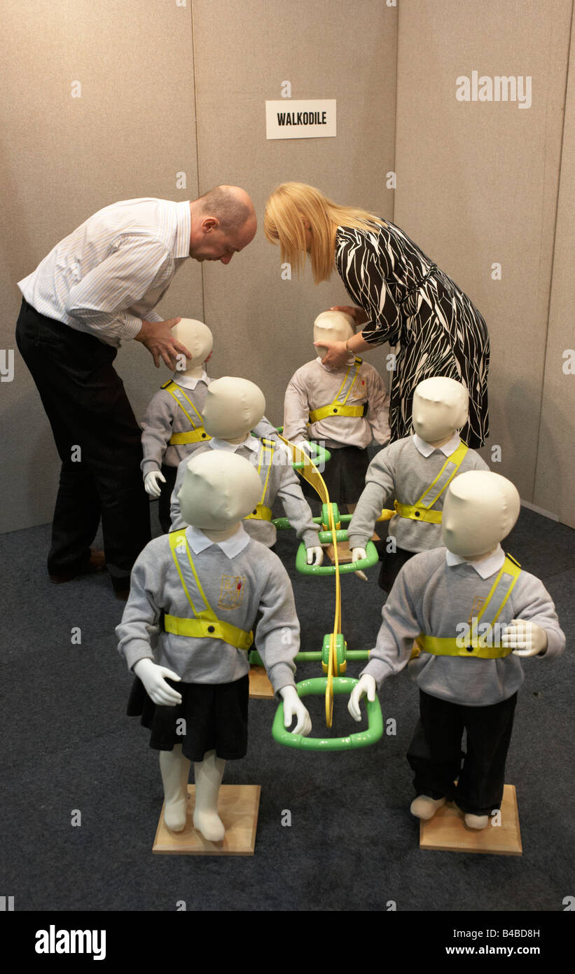 The Walkodile for better child safety is demonstrated by an entrepreneur at an inventors fair in Alexandra Palace London Stock Photo