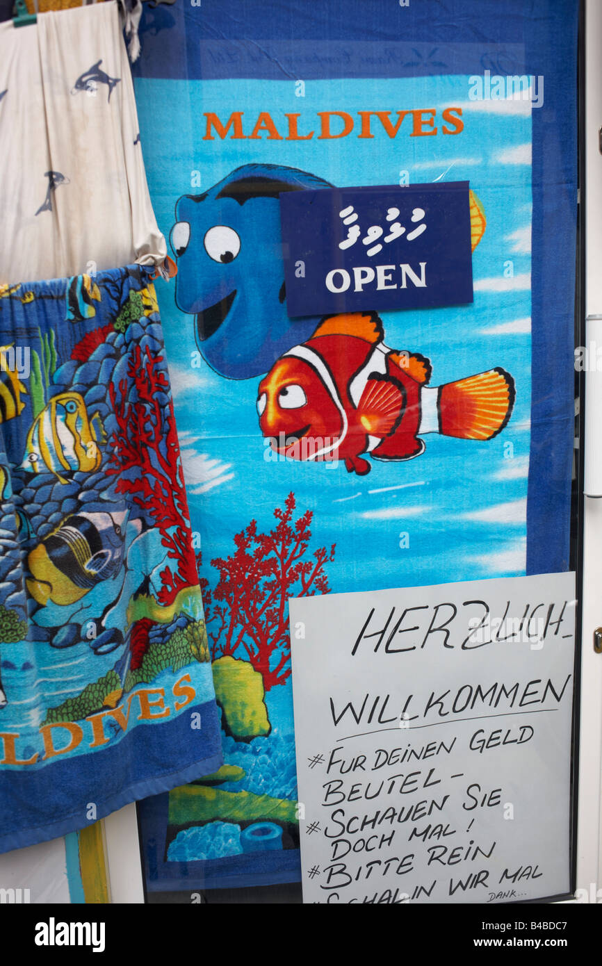 Pixar movie "Finding Nemo" Clownfishes printed on to tourist towels in a shop side street window in Malé, Maldives Stock Photo