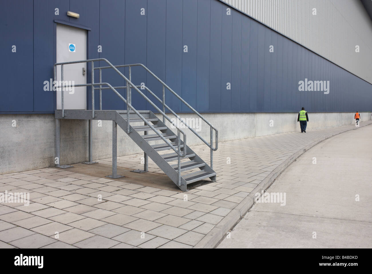 Supermarket chain Sainbury's visitors walk into the distance at the company's 700,000 sq ft distribution depot at Waltham Point Stock Photo