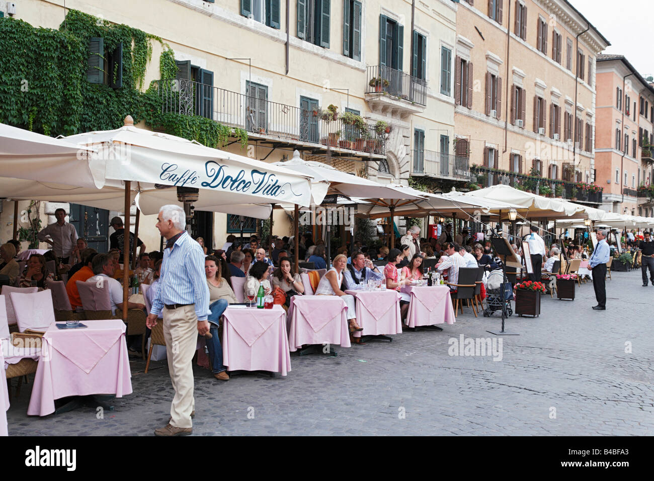 Guests in pavement cafes at Piazza de Navona Rome Italy Stock Photo