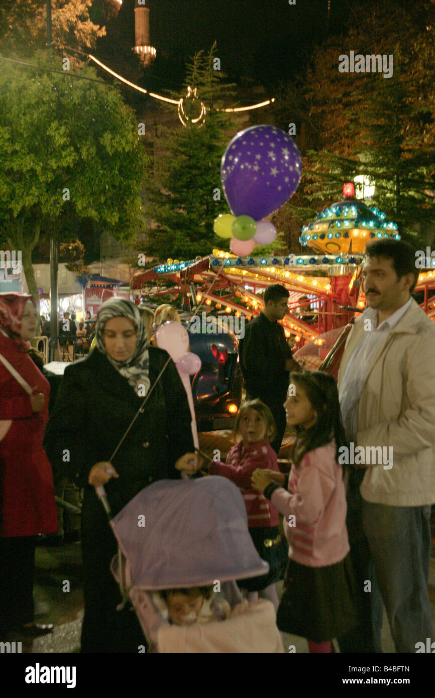 A Turkish family enjoying the Ramadan festivities on the Hippodrome in