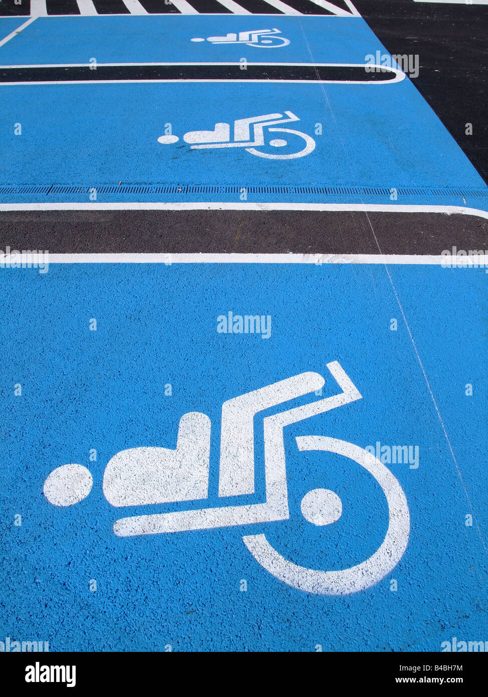 Handicap / disabled  parking space on a french supermarket Stock Photo