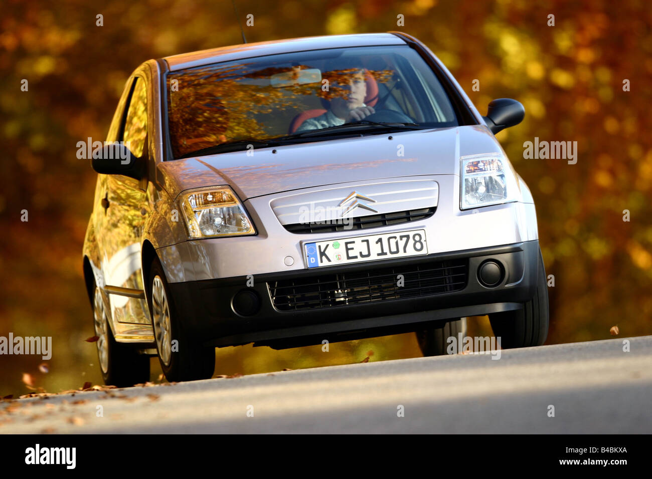 Car, Citroen C2 1.4 HDi SX, model year 2003-, silver, Miniapprox.s, Limousine, FGHDS, driving, diagonal from the front, frontal Stock Photo