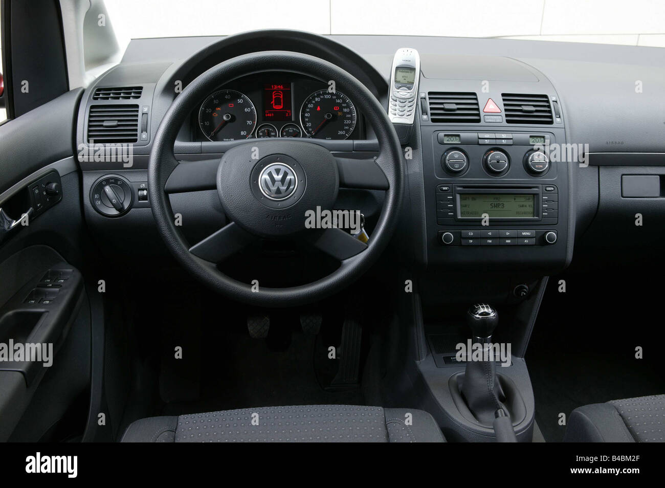 Car, VW Touran, Van, model year 2003-, red, interior Interior view, Cockpit, technique/accessory, accessories Stock Photo - Alamy