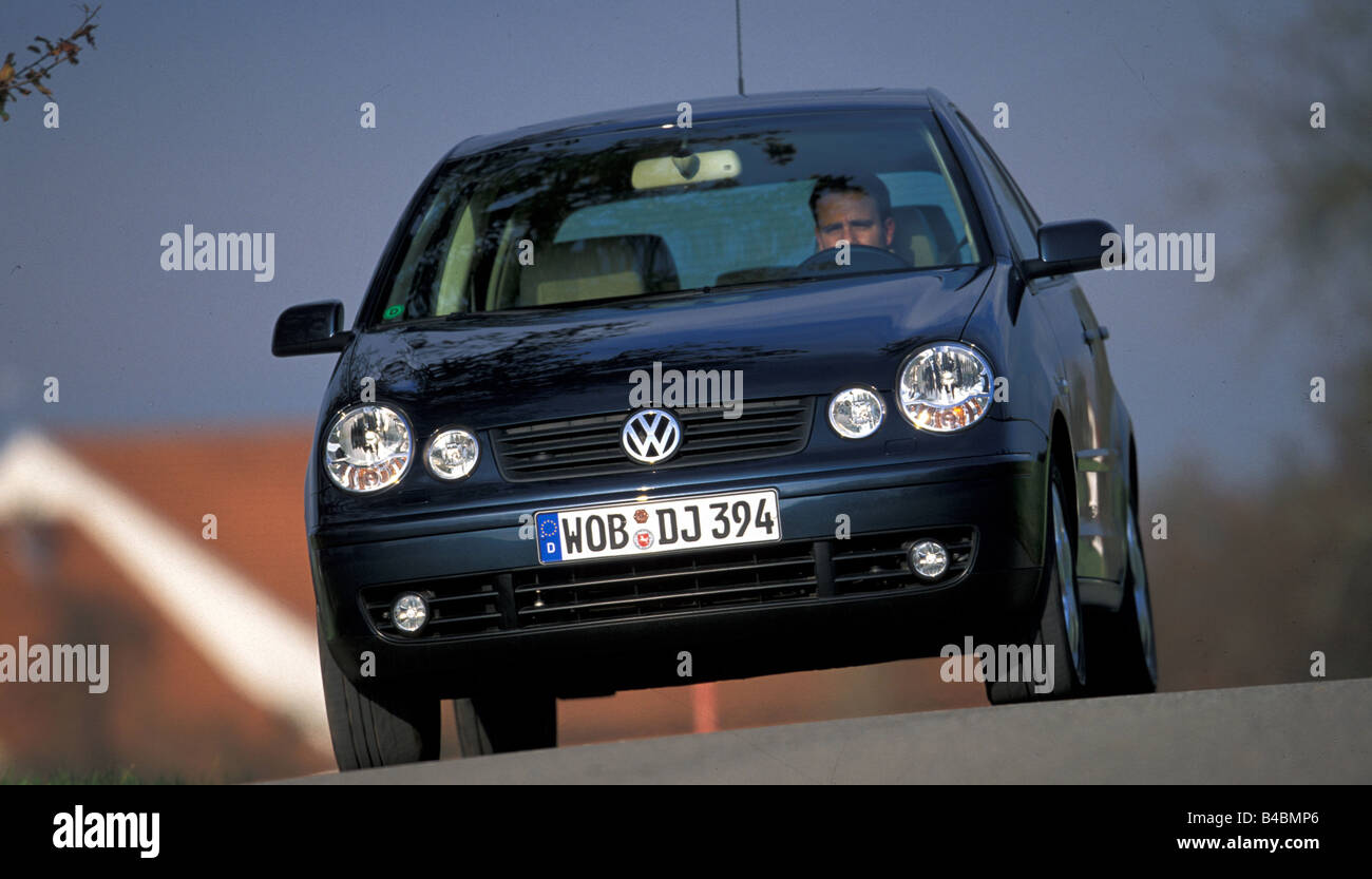 Car, VW Volkswagen Polo, Limousine, small approx., blue, model year 2002-,  driving, diagonal from the front, frontal view, City Stock Photo - Alamy