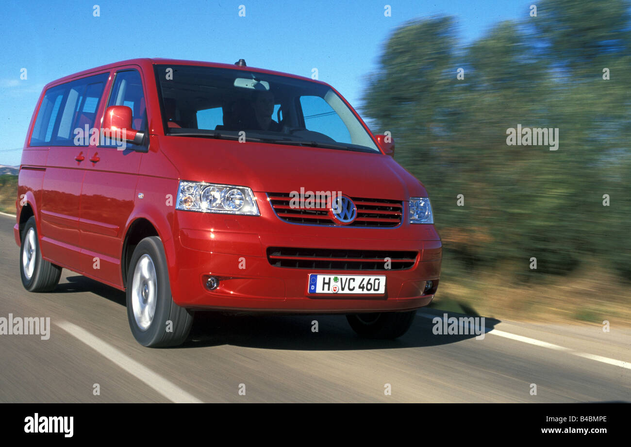 Car, VW Volkswagen Multivan T5, Van, model year 2003-, red, driving,  country road, diagonal from the front, Front view Stock Photo - Alamy