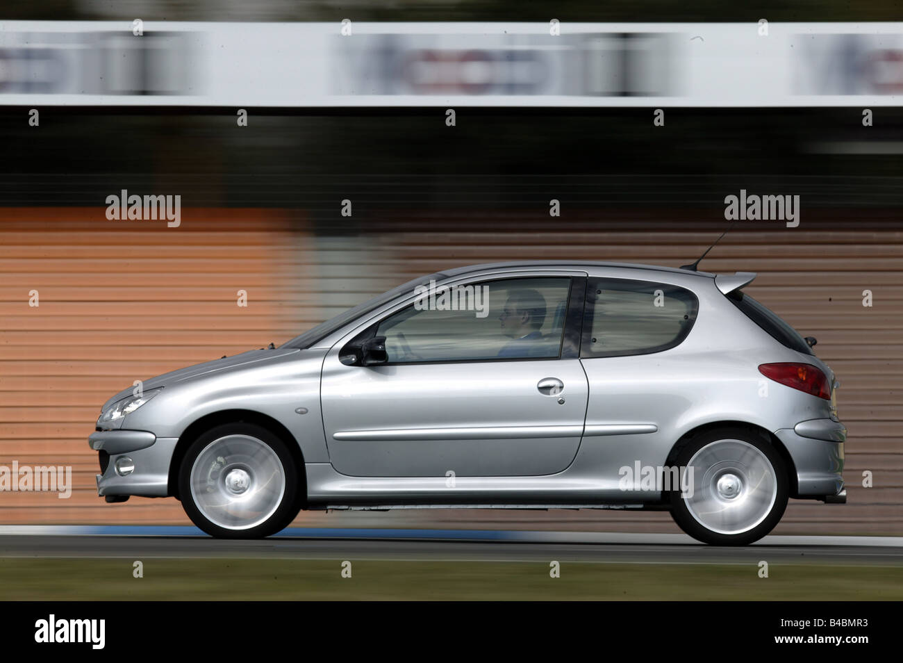 Car, Peugeot 206 RC, Limousine, small approx., model year 2003-, silver, driving, side view, Test track Stock Photo