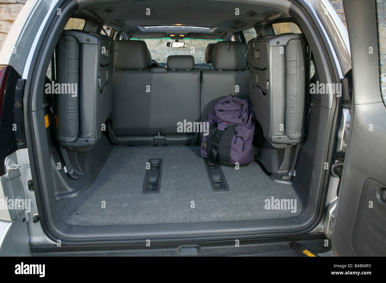 Car, Toyota Land Cruiser 3.0 D4D, cross country vehicle, model year 2002-,  silver, view into boot, technique/accessory, accessor Stock Photo - Alamy