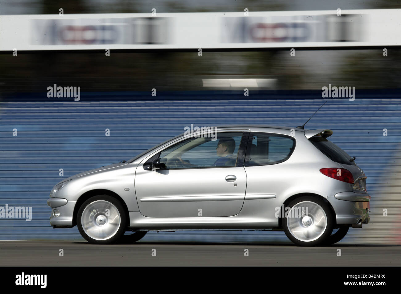 Car, Peugeot 206 RC, Limousine, small approx., model year 2003-, silver, driving, side view, Test track Stock Photo