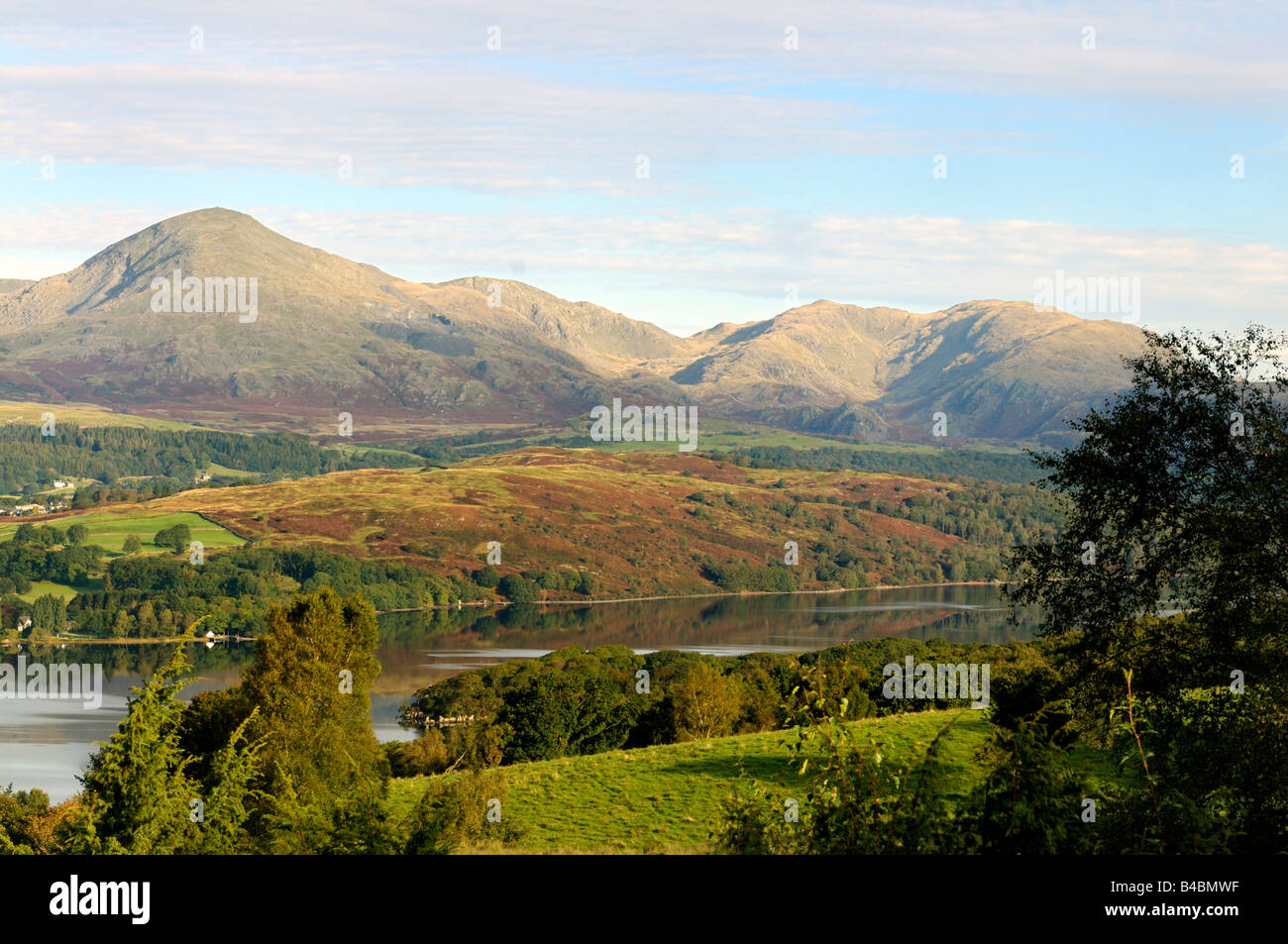 A scenic view of Coniston Water, The Old Man of Coniston and the Coniston fells Stock Photo