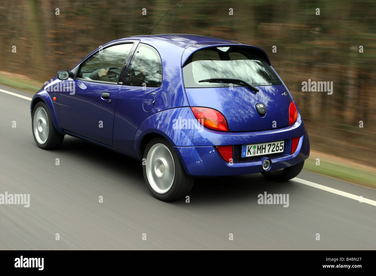 Car, Ford Sportka 1.6, Limousine, Miniapprox.s, model year 2003-, blue, 70  kw, FGAH, driving, diagonal from the front, rear view Stock Photo - Alamy