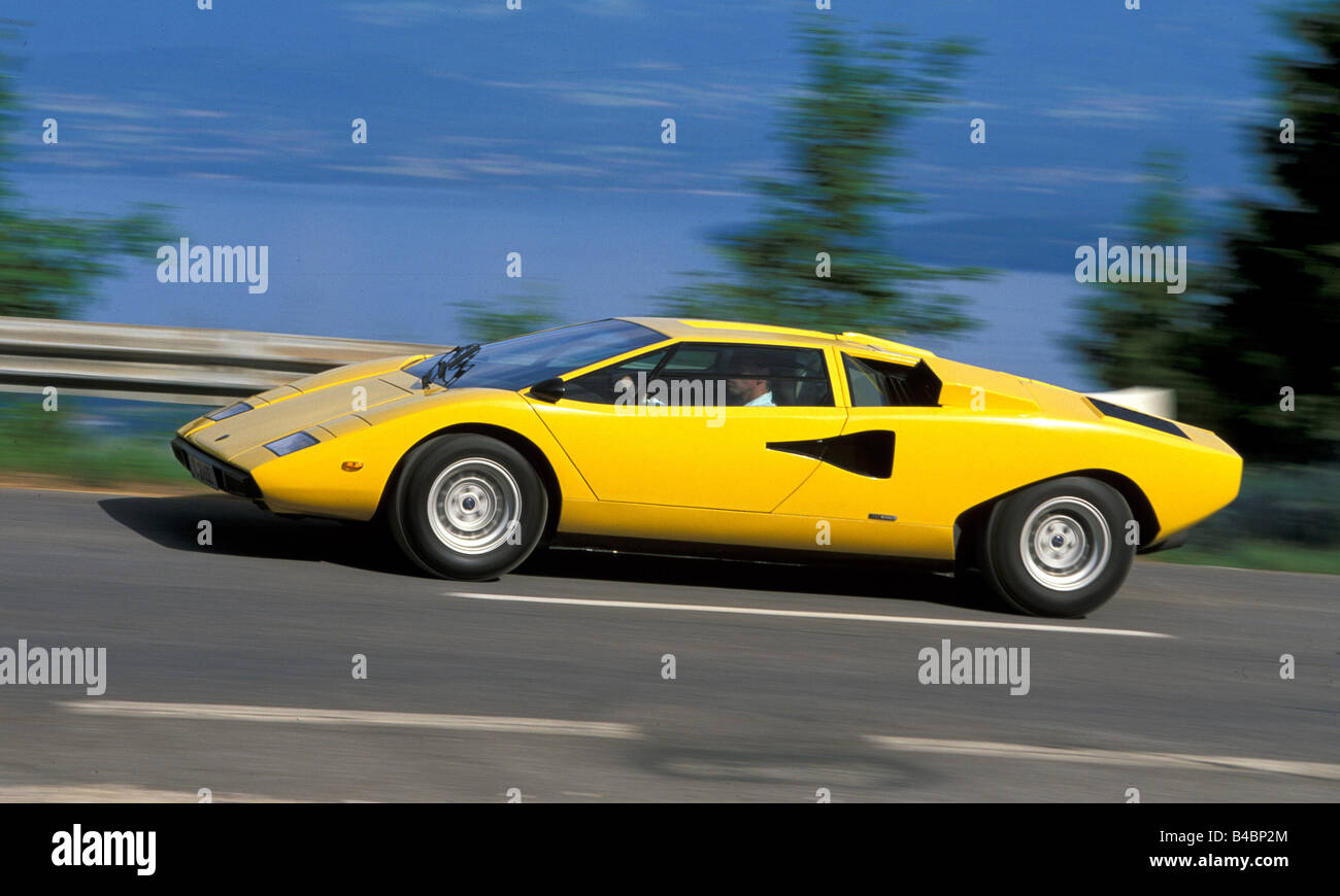 Car, Lamborghini Countach, roadster, model year 1974, yellow, coupe/Coupe, FGUJ, driving, side view, country road Stock Photo