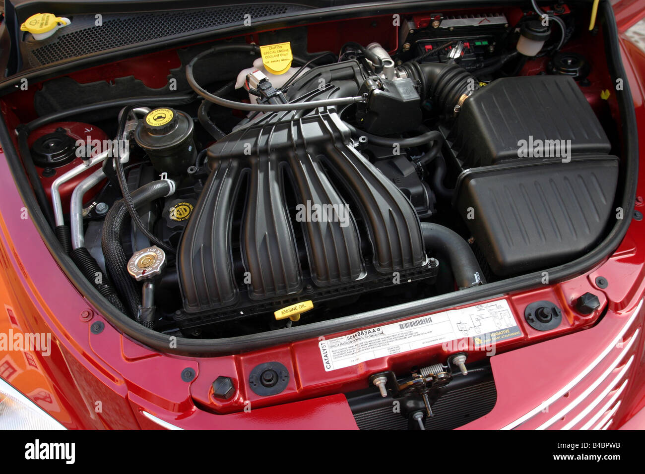 Car, Chrysler PT Cruiser Convertible Limeted 2.4L, 150 PS, Cabrio, ruby colored, model year 2003-, FGAH, view in engine compartm Stock Photo