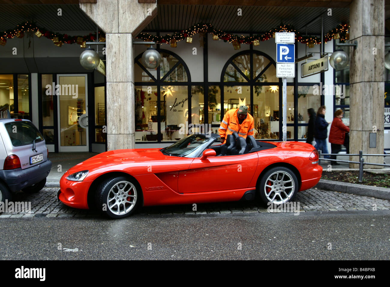 Car, Dodge Viper SRT-10, Convertible, model year 2003-, red, FGHDS, open top, standing, upholding, parked in, Car park, side vie Stock Photo