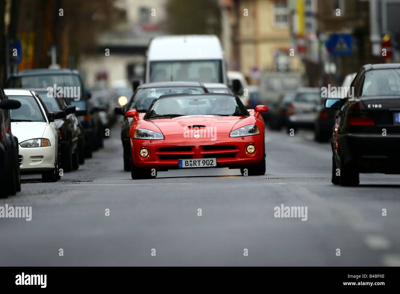 Car, Dodge Viper SRT-10, Convertible, model year 2003-, red, FGHDS, open top, driving, frontal view, City Stock Photo