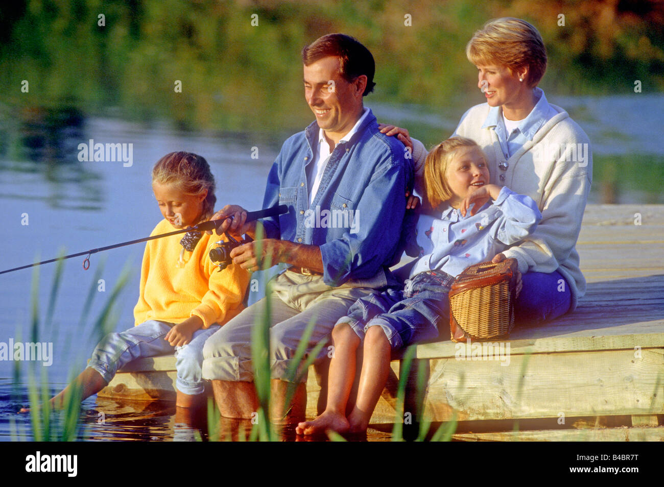 Father children enjoying fishing hi-res stock photography and images ...