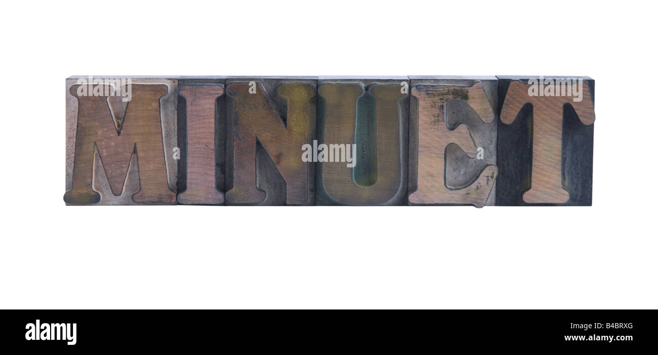 the word 'minuet' in old, ink-stained wood type Stock Photo