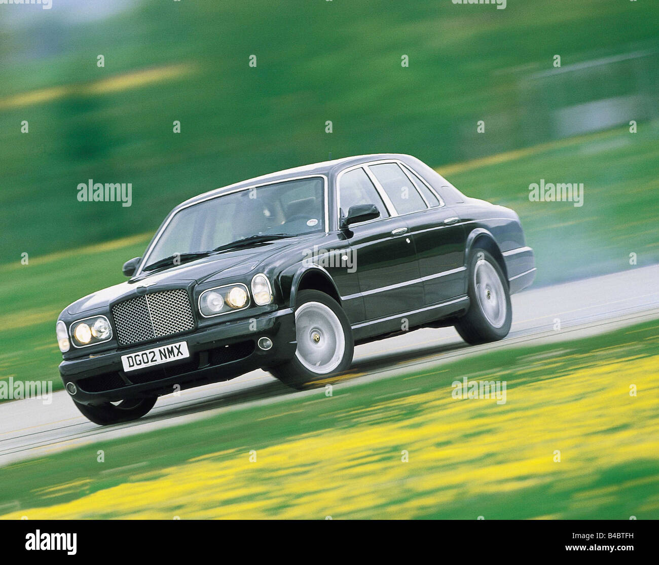 Car, Bentley Arnage T, Limousine, Luxury approx.s, model year 2002-, diagonal from the front, driving, country road, ams 11/2002 Stock Photo