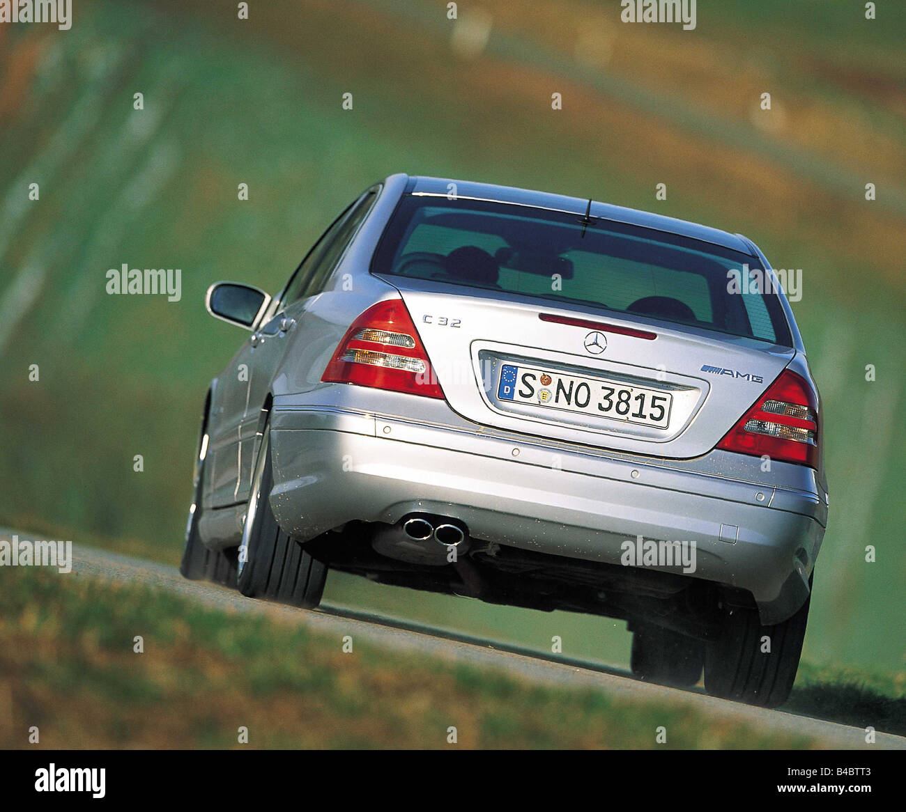 Car, Mercedes C 32 AMG, Sportcoupé, medium class, roadster, diagonal from the back, silver, driving, 354 PS, 3.2 liters cylinder Stock Photo
