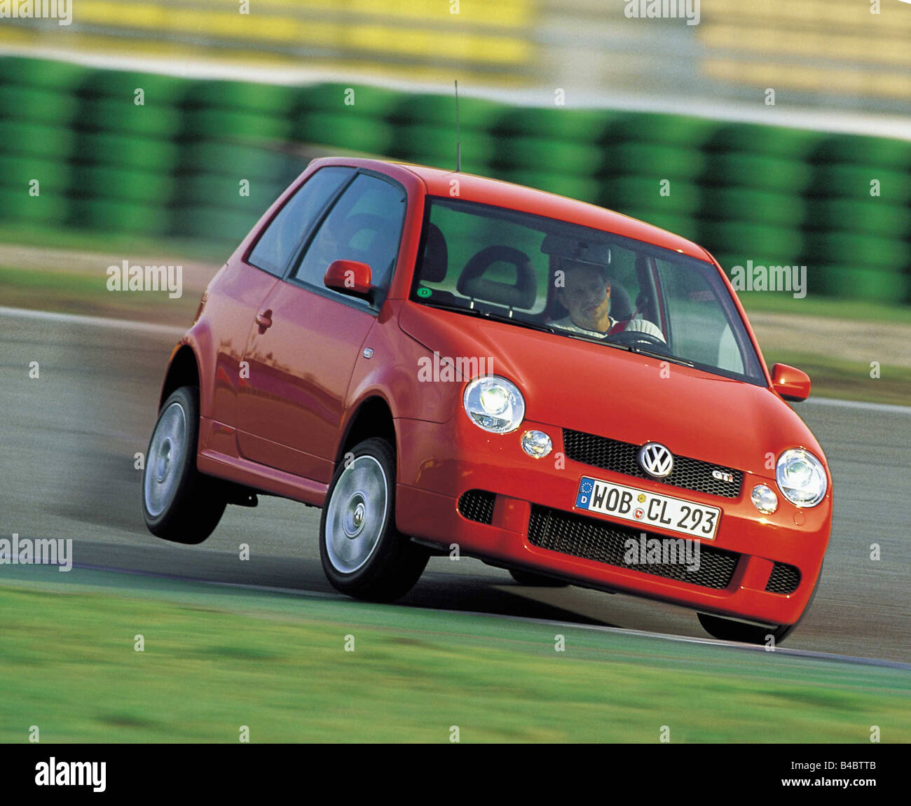Car, VW Volkswagen Lupo GTI, Miniapprox.s, Limousine, red, model year 1998-, diagonal from the front, ams 01/2001, Seite 026 Stock Photo