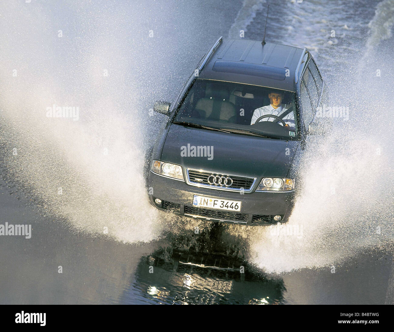 Car, Audi allroad quattro, hatchback, Avant, model year 2000-, green, diagonal from the front, Water, wet highway, Aquaplaning, Stock Photo