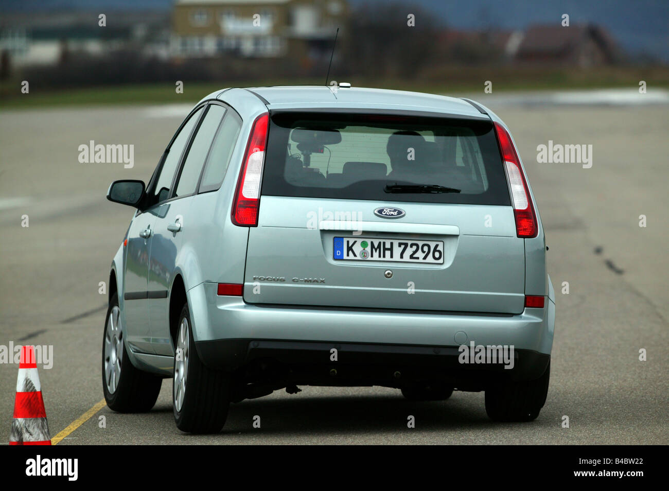Car, Ford Focus C-Max, Limousine, Lower middle-sized class, model year 2003-, silver, ESP comparison, driving, diagonal from the Stock Photo