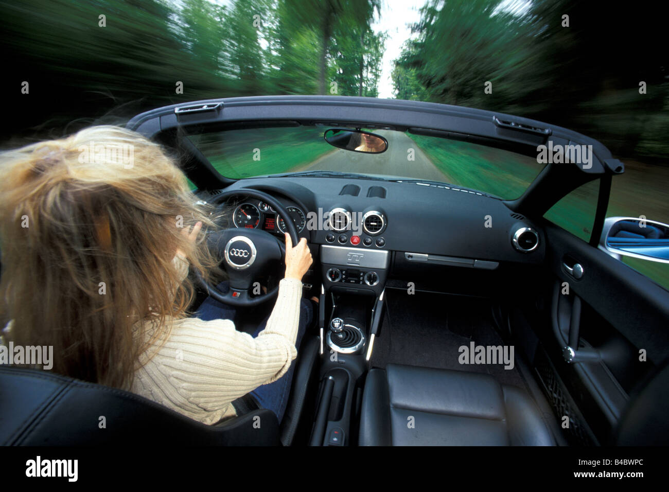 Car, Woman and approx., Woman in convertible, driving, interior view