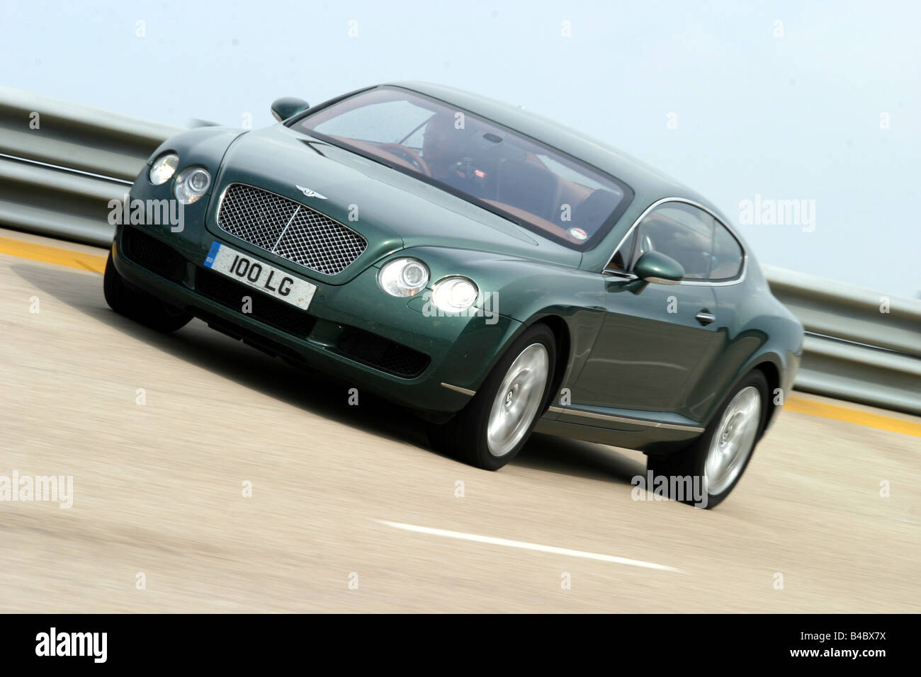 Car, Bentley Continental GT, roadster, model year 2003-, Coupe/coupe, dark  green, driving, diagonal from the front, frontal view Stock Photo - Alamy