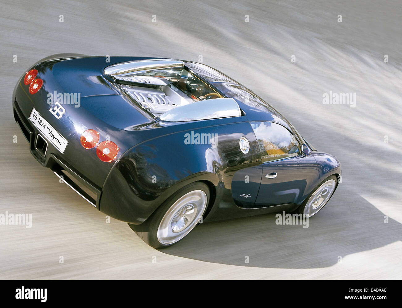 Car, Bugatti Veyron 18/4, roadster, model year 2000-, driving, diagonal from the back, blue/black, 500 PS, 6.3 liters, 18 cylind Stock Photo