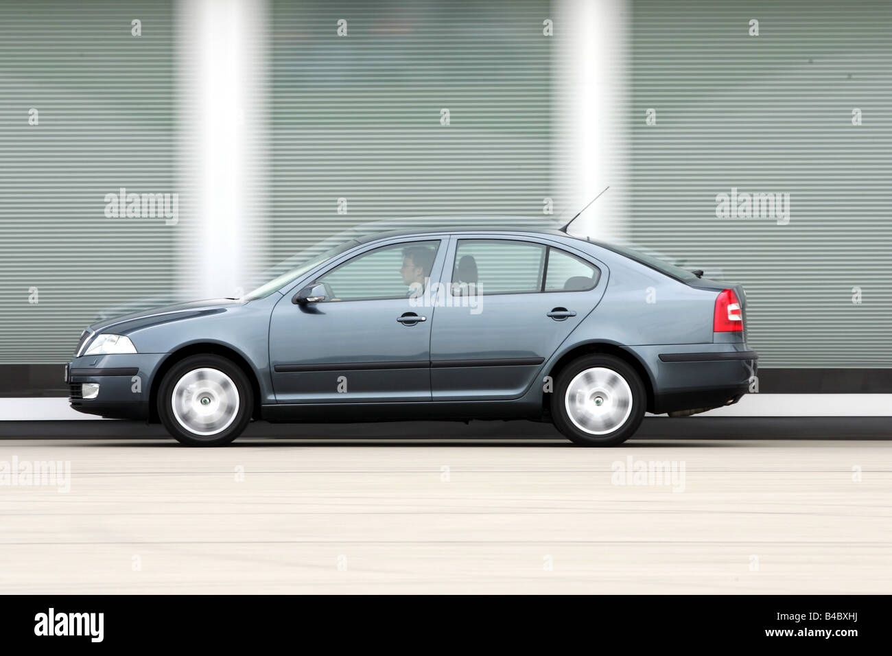 Car, Skoda Octavia 1.6 Elegance, Limousine, bluish grey, model year 2004-,  Lower middle-sized class, driving, side view, photogr Stock Photo - Alamy