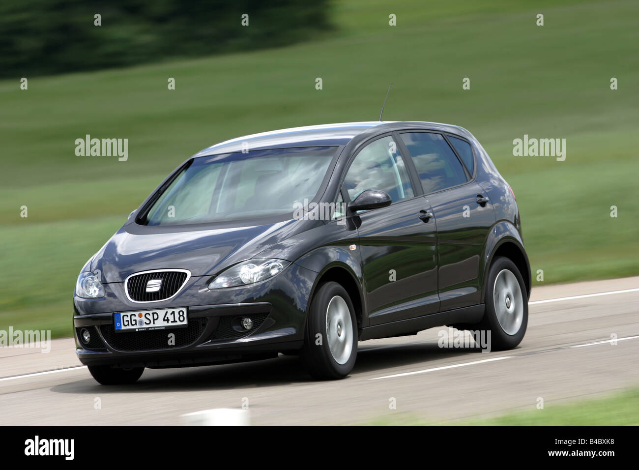 Car, Seat Altea, black, Van, model year 2004-, driving, diagonal from the  front, frontal view, country road, photographer: Achim Stock Photo - Alamy