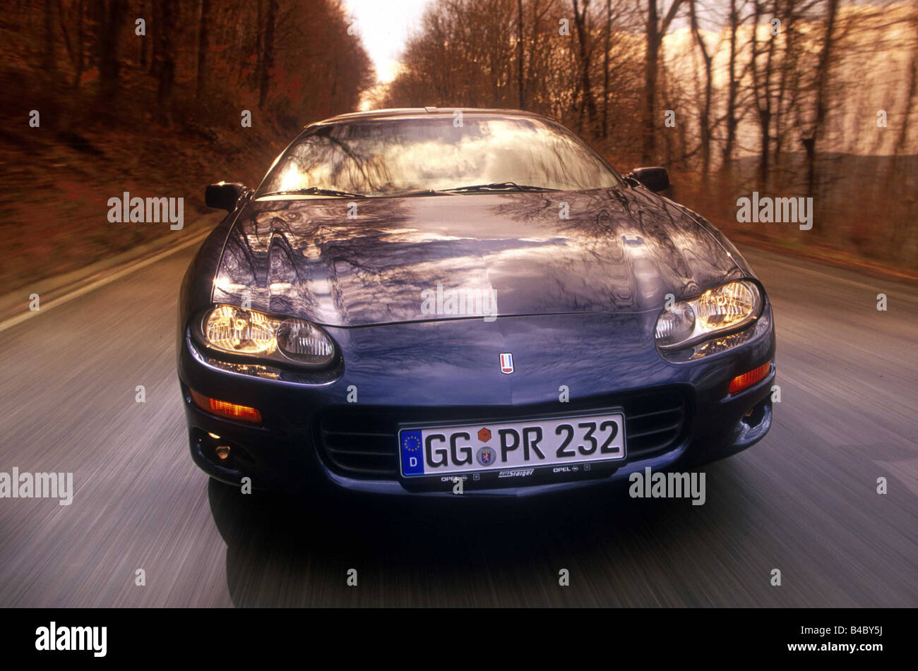 Car, Chevrolet Camaro Z 28 Impression, coupe, roadster, model year 1998-, blue, diagonal from the front, driving, frontal view, Stock Photo