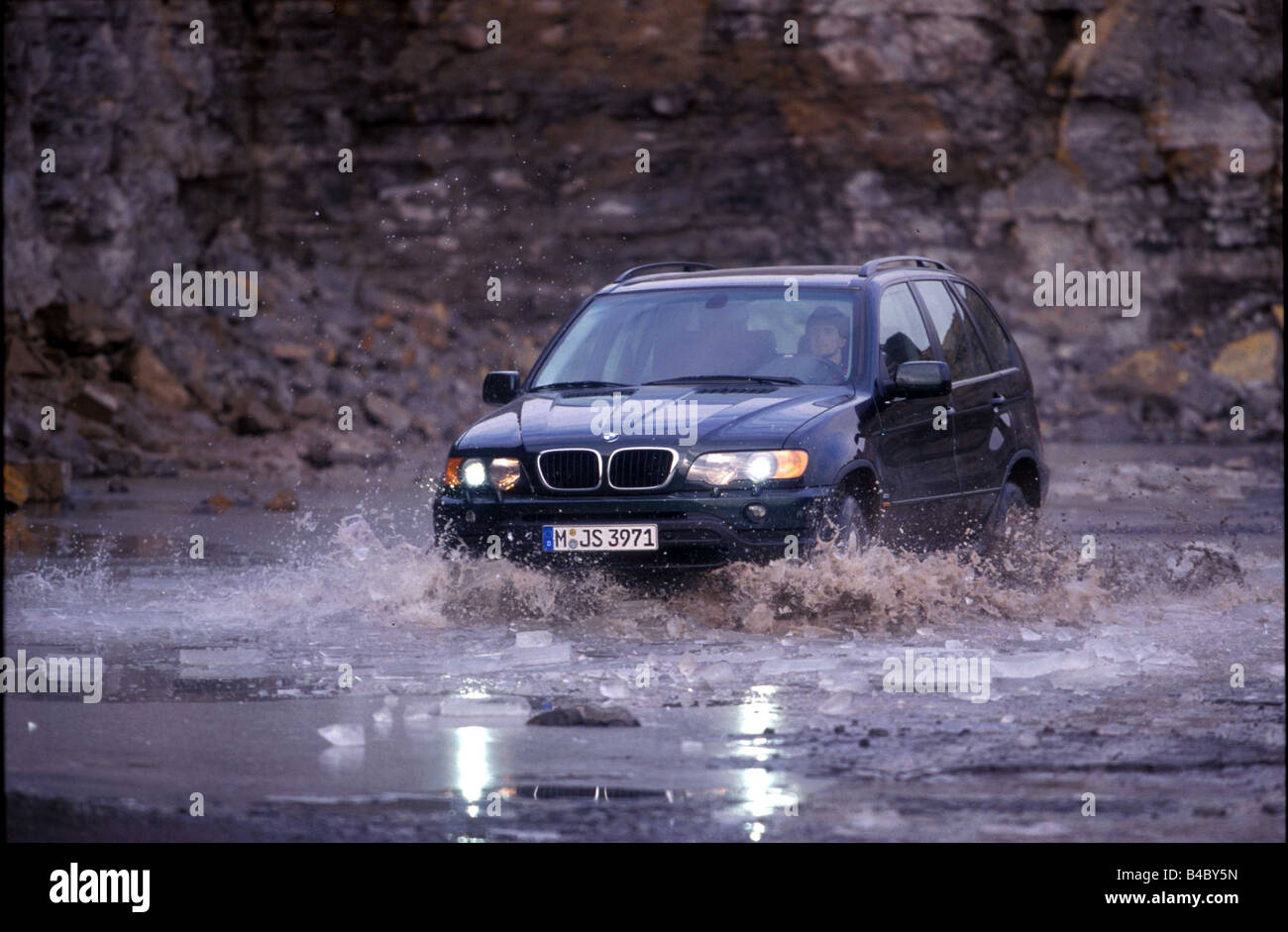 Car, BMW X5 3.0i, cross country vehicle, model year 2000-, black, diagonal  from the front, driving, offroad, Water Stock Photo - Alamy