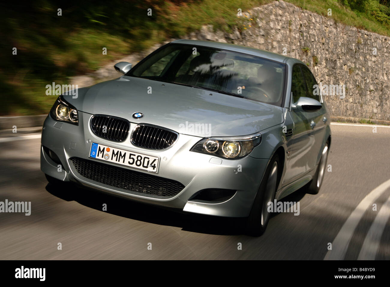 BMW M5, model year 2005-, black, driving, diagonal from the back, rear  view, test track Stock Photo - Alamy