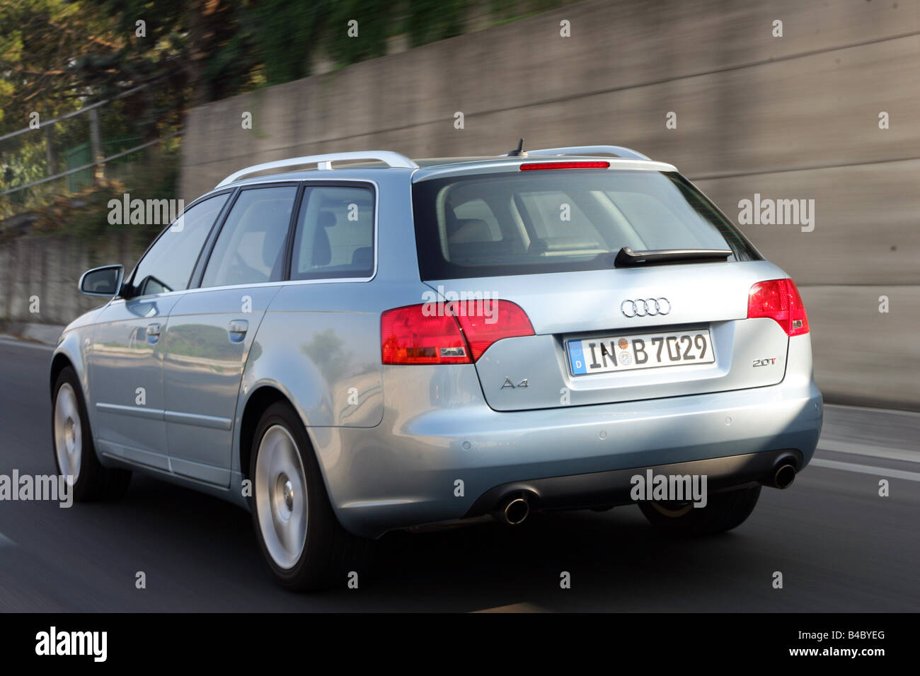 Car, Audi A4 Avant, Facelift, model year 2004-, silver-blue, hatchback, Limousine, medium class, driving, diagonal from the back Stock Photo