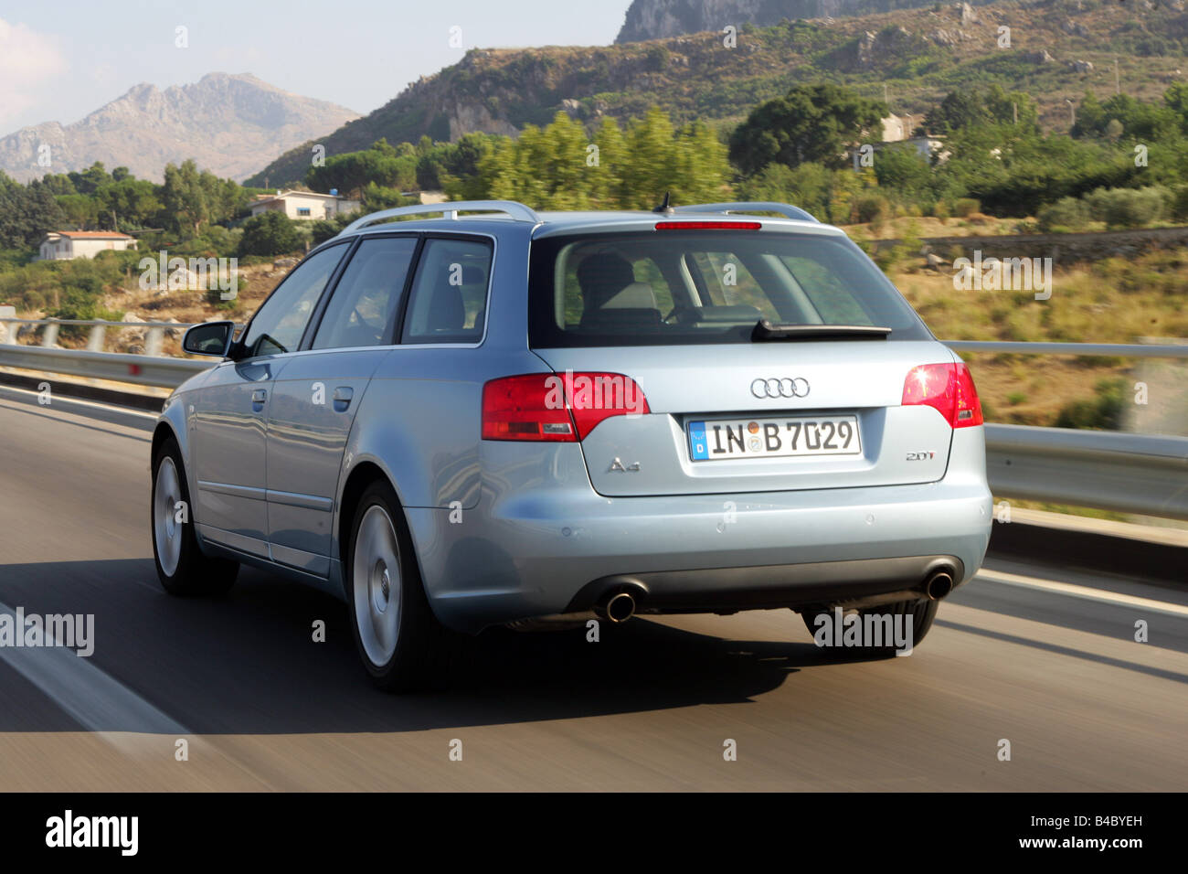 Car, Audi A4 Avant, Facelift, model year 2004-, silver-blue, hatchback, Limousine, medium class, driving, diagonal from the back Stock Photo