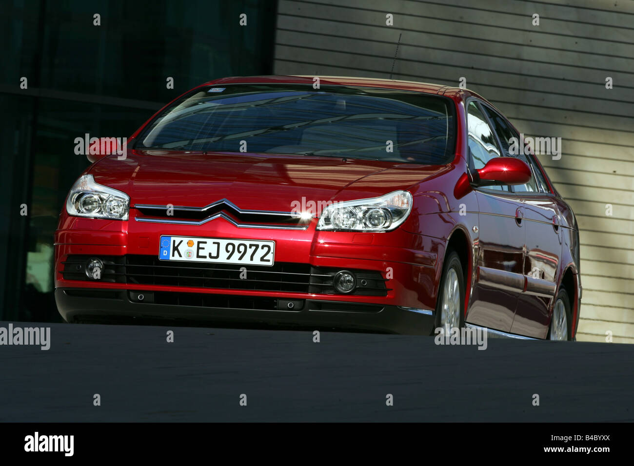 Car, Citroen C5 HDI 135, model year 2004-, red, medium class, Limousine, driving, diagonal from the front, frontal view, City, p Stock Photo
