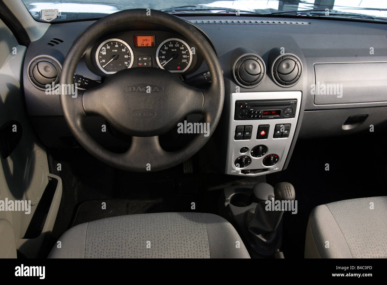Car, Dacia Logan, model year 2004-, Limousine, Lower middle-sized class,  red, interior view, Interior view, Cockpit, technique/a Stock Photo - Alamy