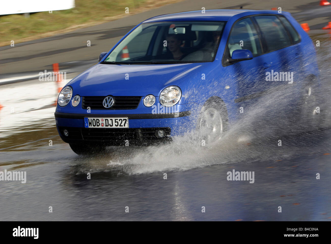 Car, Safe driving training VW Volkswagen Volkswagen Polo, test track,  Water, Aquaplaning, brakes, brake test, Security, moving Stock Photo - Alamy