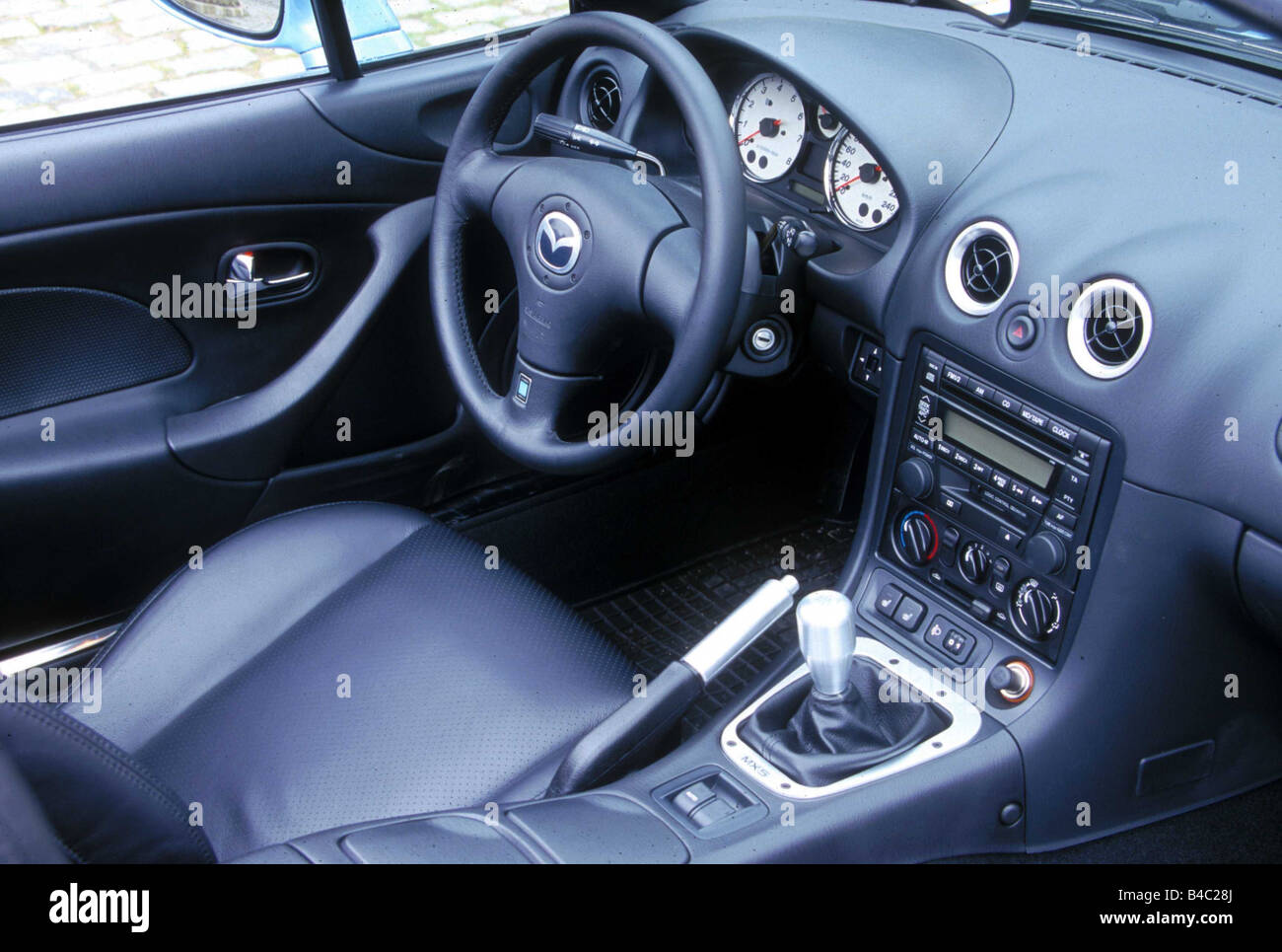 Car, Mazda MX-5, Convertible, model year 2001-, light blue-metallic, open  top, interior view, Interior view, Cockpit, technique Stock Photo - Alamy