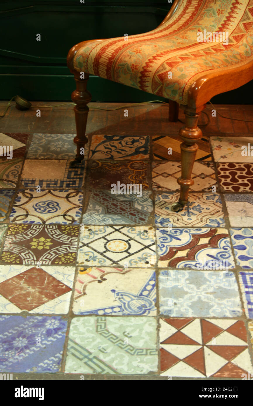 one antique type chair inside shop window display at night Stock Photo ...
