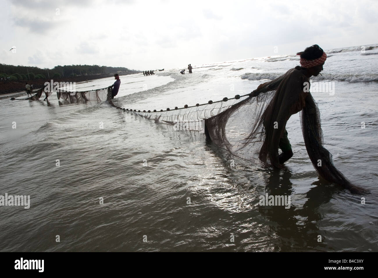 A fisherman engaged in fishing activities at Digha,West Bengal,India
