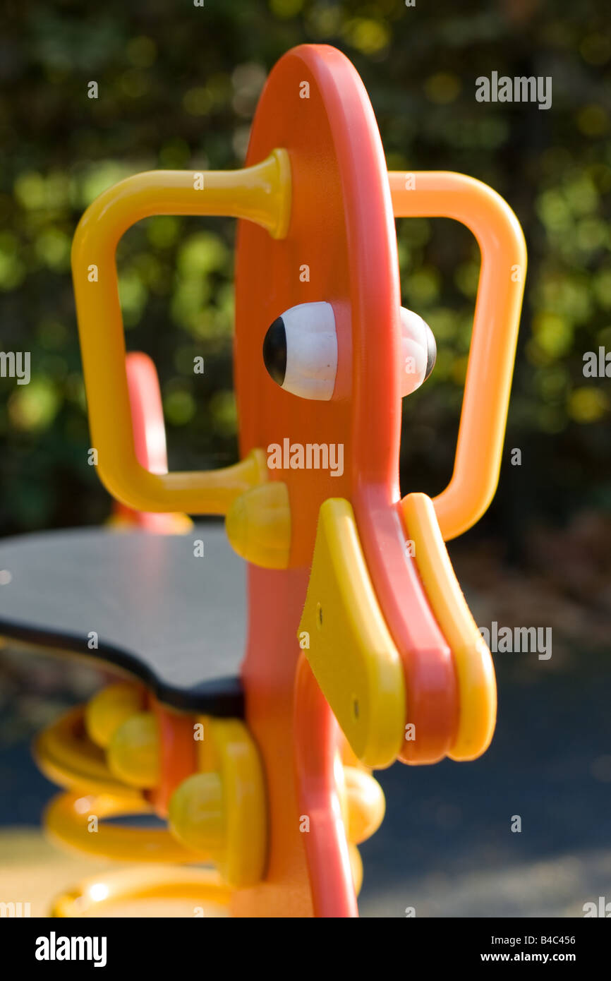 Duck spring rider in a childrens playground Stock Photo