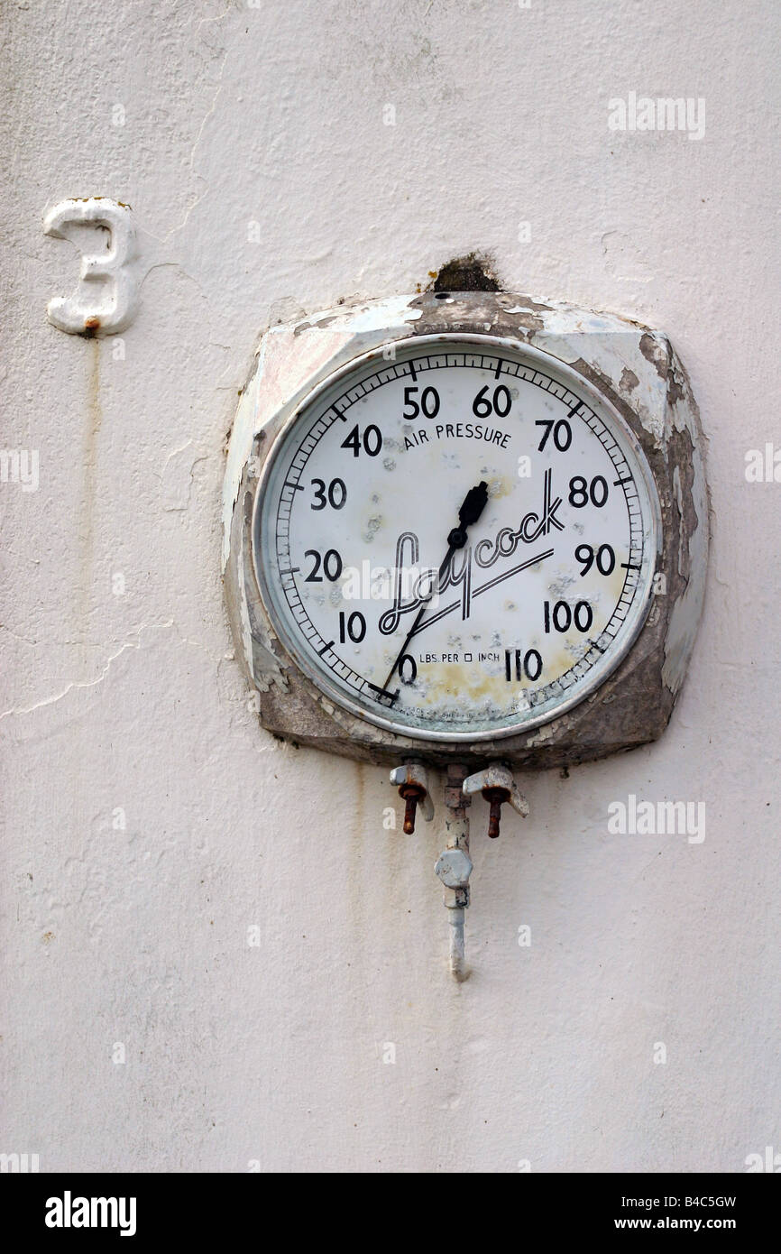 Old garage tire pressure gauge Stock Photo - Alamy