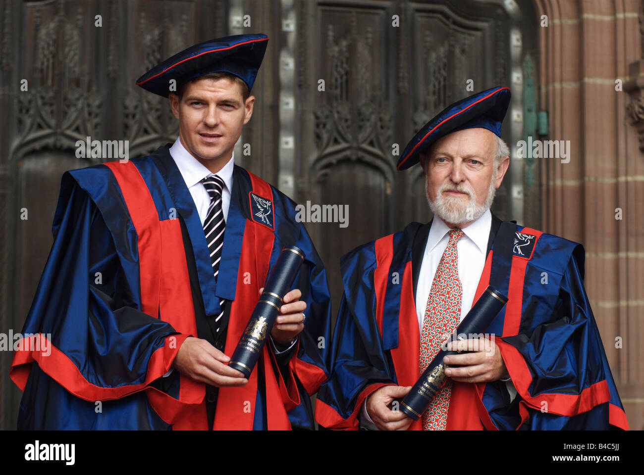 Steven Gerrard with Richard Stilgoe, received an Honorary Fellowship from Liverpool John Moores University. Stock Photo