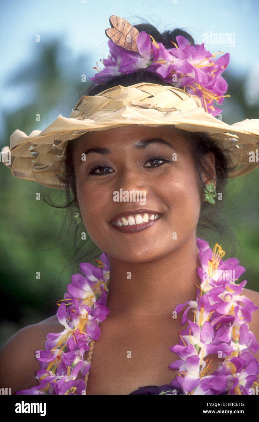 Beautiful Hawaiian Girl Wearing An Orchid Lei Smiles A Welcome In