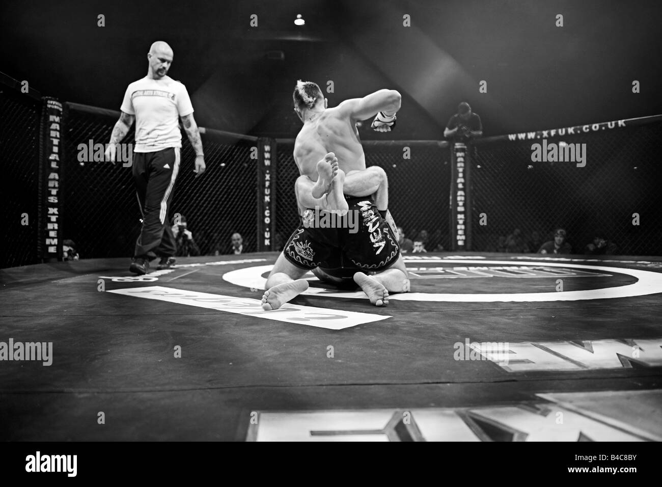 Cage Fighters in action during a Cage Wars competition held at Brahead arena in Glasgow MMA Fighters Mixed Martial Arts fighters Stock Photo