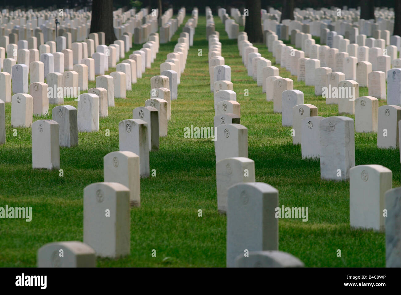 Dozens of unmarked military tombs in a cemetary Stock Photo - Alamy